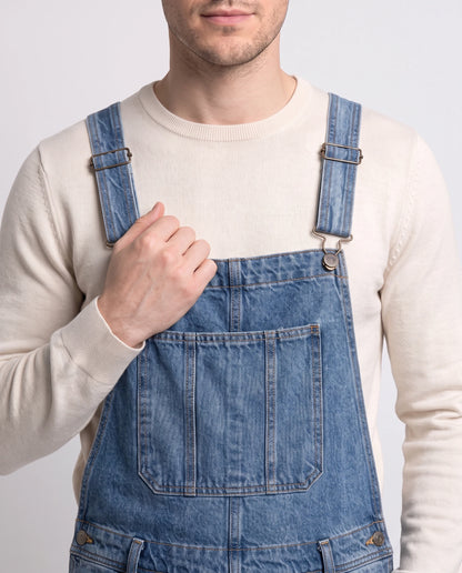 Salopette homme en jean Le Métro Bleu, coloris bleu foncé, détail de la bavette et des bretelles réglables